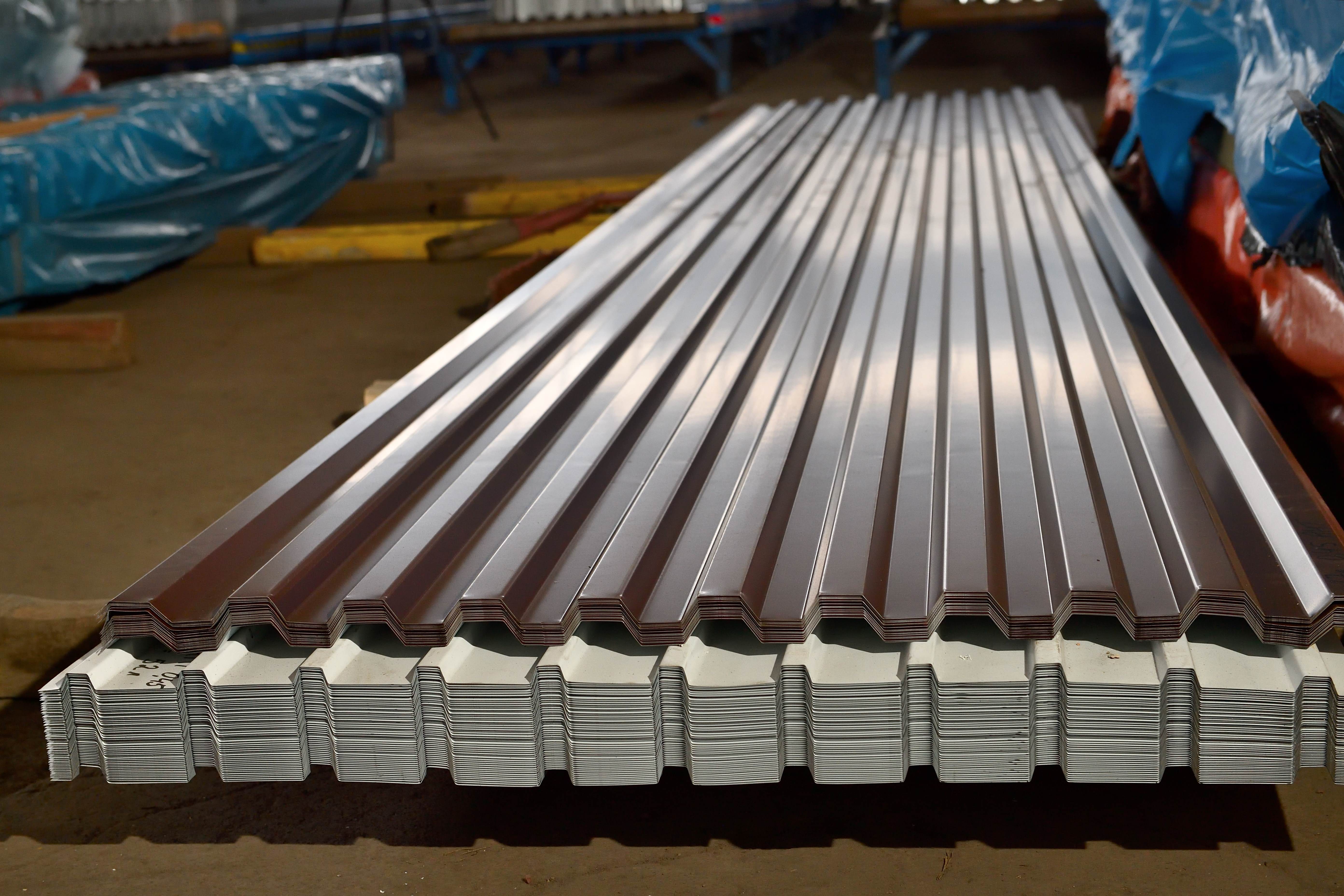 Galvanized profiled sheets and galvanized sheets with coating