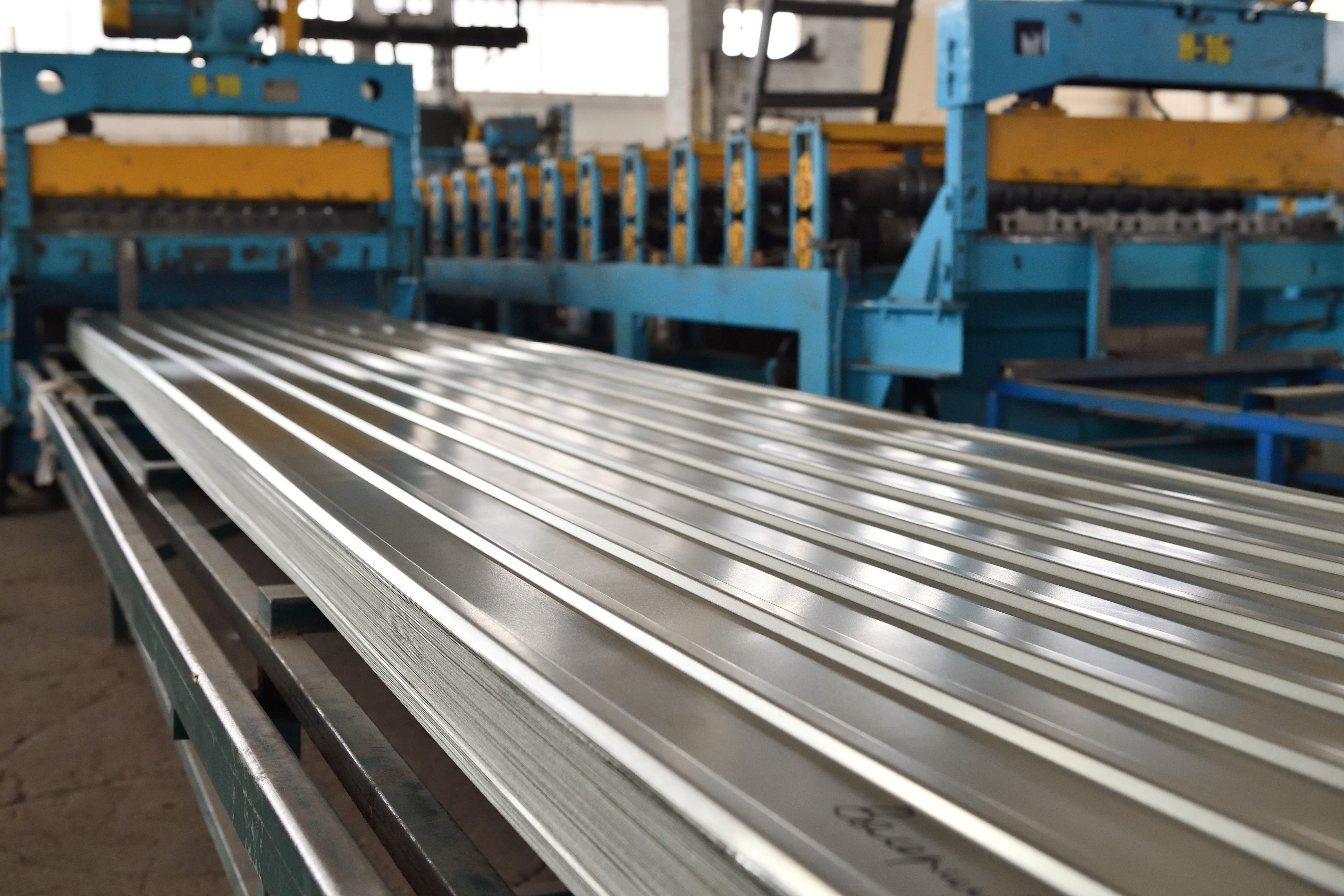 Galvanized profiled sheets and galvanized sheets with coating